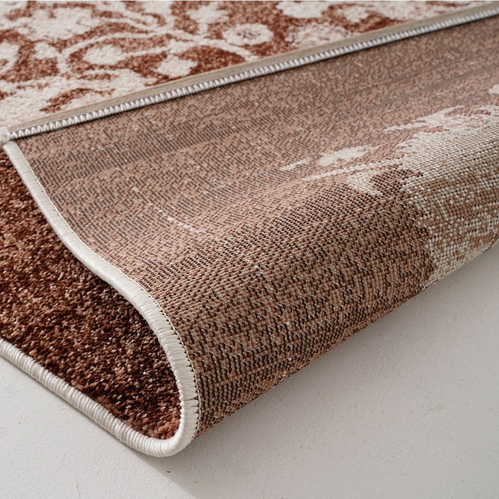 Tapis en polypropylène à médaillon floral vieilli Kellan