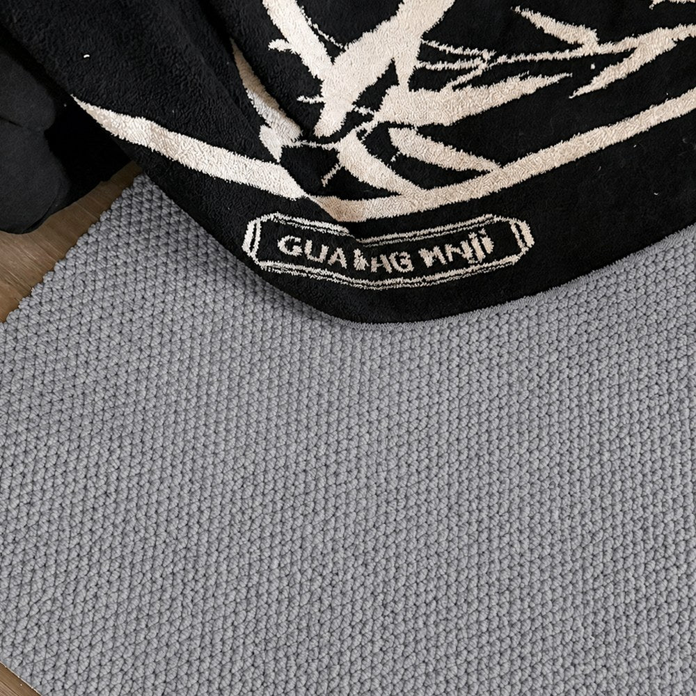 Tapis sur mesure texturé en laine douce Liora