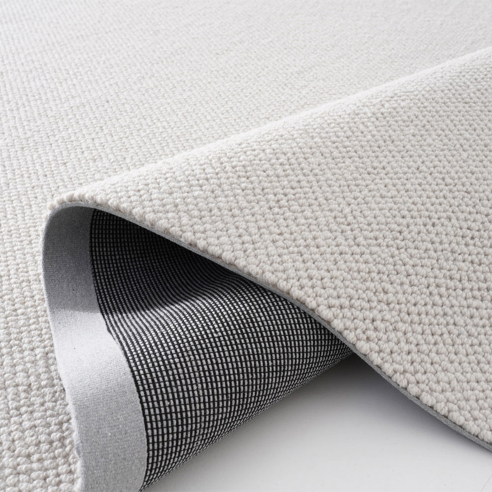 Tapis sur mesure texturé en laine douce Liora