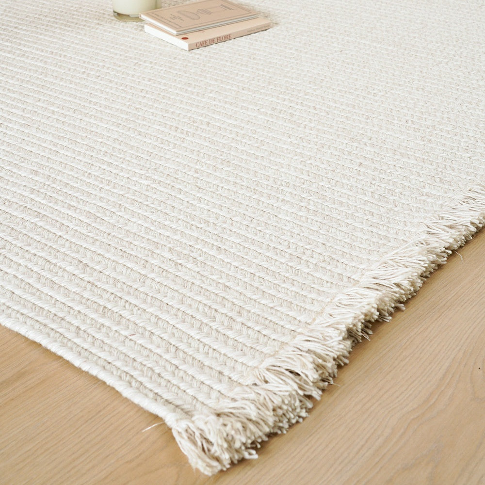 Tapis personnalisé Naya tissé main en laine et jute